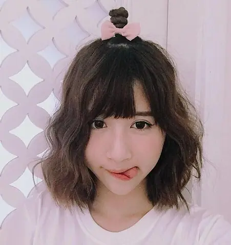 Cách Buộc Chỏm Tóc Trên Đầu