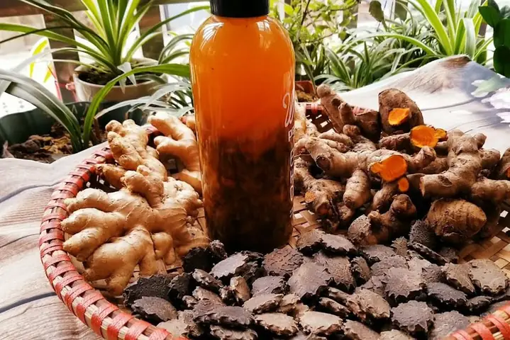 Cách Làm Rượu Nghệ Thoa Mặt Sau Sinh