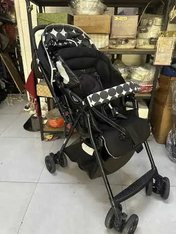 Giá Bán Xe Đẩy Trẻ Em
